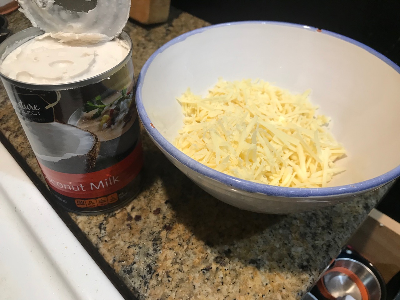 ingredients shot- shredded cheese and coconut milk