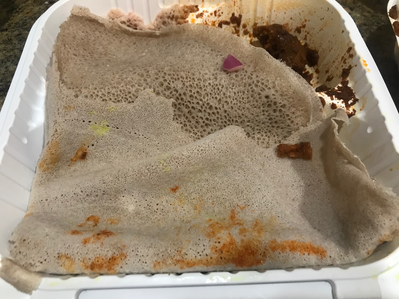 injera in the takeout container