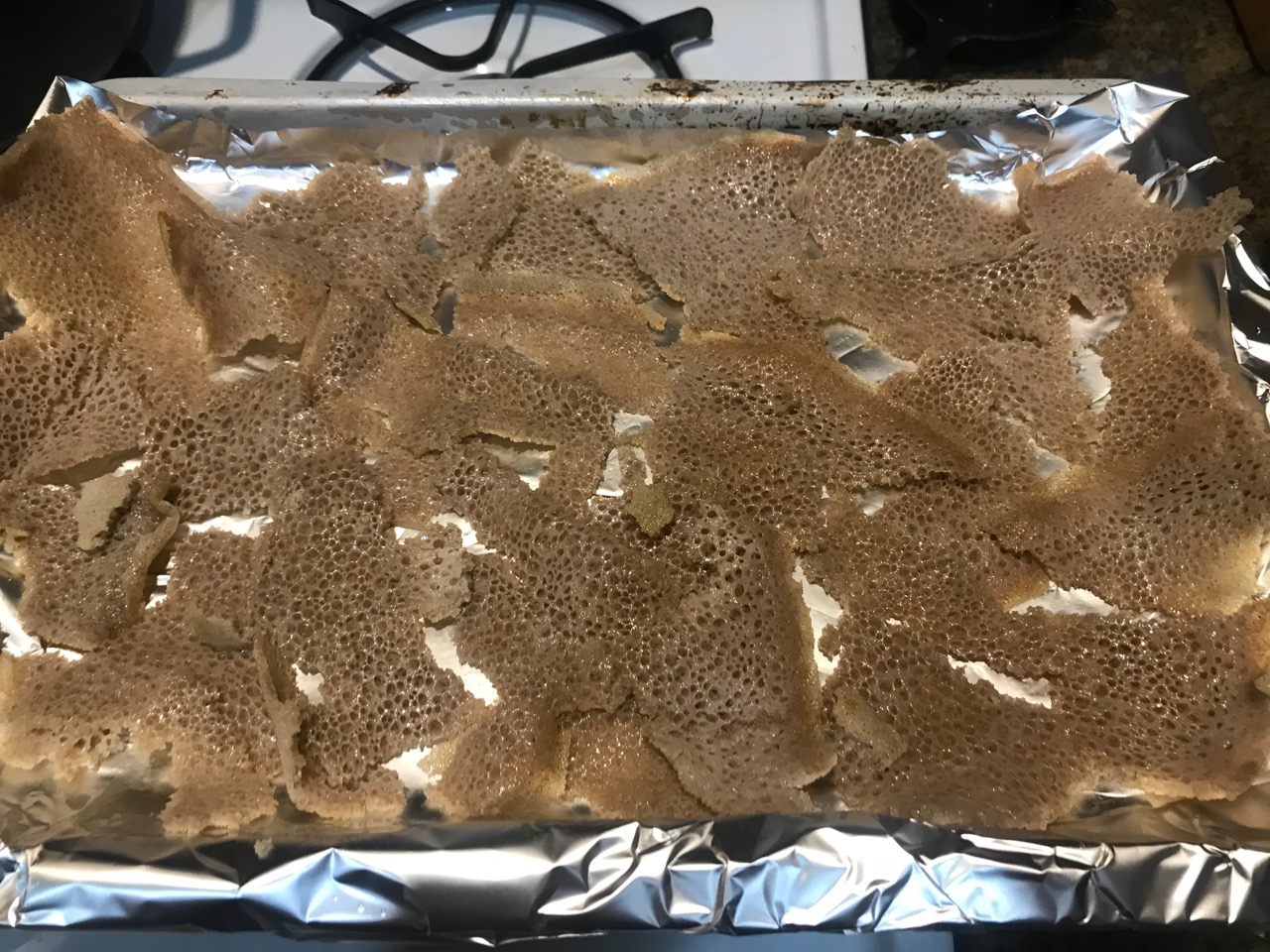 pre-baked injera chips on a tray
