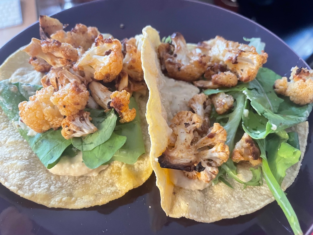 side view of cauliflower tacos plated